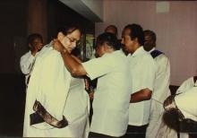 Mr. K. L. Chugh dons a convocation robe during the 30th Convocation, 1993