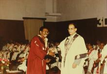 Mr. K. L. Chugh, Chairman of ITC Limited, Calcutta, presents a degree to a graduand during the 30th Convocation, 1993