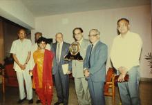 Mr. K. L. Chugh, Chairman of ITC Limited, Calcutta, with a memento that was presented to him during the 30th Convocation, 1993
