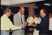 Mr. A. L. Mudaliar presents a shield to Dr. V. S. Arunachalam and Prof. L. S. Srinath at the 25th convocation