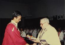 Dr. Russi Mody congratulates a prize winner at the 26th convocation