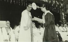 A student receives her degree from Prof. R. G. Narayanamurthi
