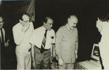 Brand new computer terminal being inspected, 1988