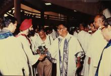 The chief guest greets members of the board of governors and faculty