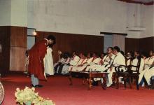 A graduate bows to the chief guest before proceeding to receive his degree