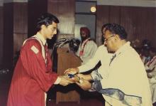 The chief guest distributes prizes to the prize winners
