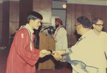The chief guest distributes prizes to the prize winners