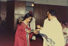 The chief guest distributes prizes to the prize winners