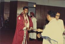 The chief guest distributes prizes to the prize winners