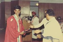 The chief guest distributes prizes to the prize winners