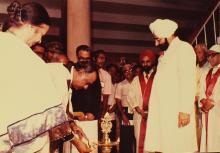 Mr. A. Sivasailam lights the lamp to inaugurate the 20th convocation, 1983