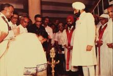Mrs. Sheila Kaul lights the lamp to inaugurate the 20th convocation, 1983
