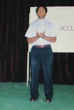 A student performing in a skit at the Accurum event