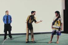 Students performing a skit at the Accurum event