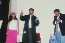 Students performing a skit at the Accurum event