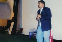 A student performing in a skit at the Accurum event