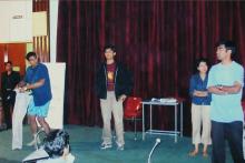 Students performing a skit at the Accurum event