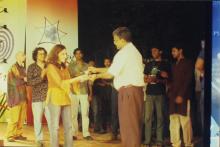 Prof. V. G. Idichandy congratulates a performer at Saarang 2005