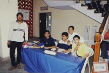 At the photography desk, 2003