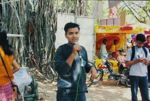 A person speaks into a microphone during Saarang, 2005