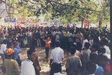 A student attempts to hit a terracotta pot blindfolded at a Saarang event