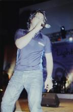 A close-up shot of singer KK performing during Saarang, 2005
