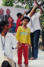 A child among the participants at a Saarang competition