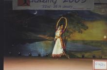 A dancer stages a performance, 2003