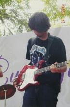 A Music event participant plays the guitar at Saarang 2005
