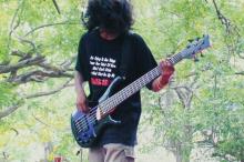 A participant plays the guitar, Saarang 2005