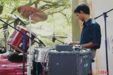 A music event participant at the drums, Saarang 2005