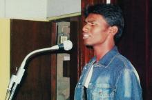 A participant sings during a music event at Saarang 2005