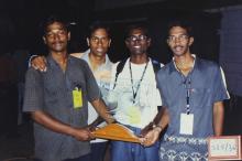 A group of students poses with the ‘Best College Trophy’, 2003