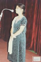 A girl stages a performance, 2003
