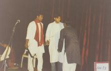 Performers stage a play, 2003
