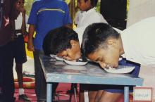 School children take part in a fun event, 2003