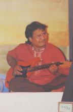 A guitarist performs at fusion night, 2003