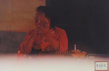 A guitarist during a performance, 2003