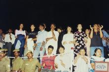 Policemen among students at an event at the Open Air Theatre, Saarang 2003