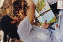A student participating in an art competition at Saarang 2003