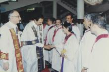 The distinguished guests and faculty interact at the 41st convocation, 2004