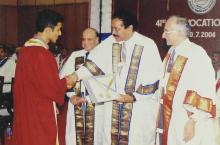A student receives a degree at the 41st convocation, 2004