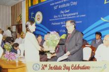 Mr. K. Ravi Kumar receives a bouquet of flowers at the 50th Institute Day, 2009