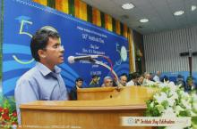A person speaks at the 50th Institute Day of IIT Madras, 2009
