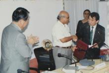 Dr. S. Narayanan and Dr. Masaharu Yanagihara shake hands at the IIT Madras-Kyushu University MoU meeting, 2006