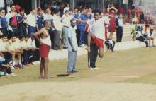 A participant jumps in the high jump event at the 12th Inter-IIT Staff Sports Meet, 2004