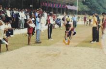 A participant competes in the high jump at the 12th Inter-IIT Staff Sports Meet, 2004