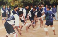 People participate in kabaddi at the 12th Inter-IIT Staff Sports Meet, 2004