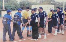 Various Indian Institutes of Technology (IITs) members shake hands at the 12th Inter IIT Staff Sports Meet 2004
