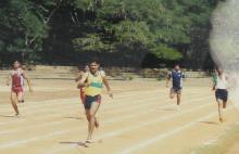 People compete in a running event at the 12th Inter-IIT Staff Sports Meet, 2004